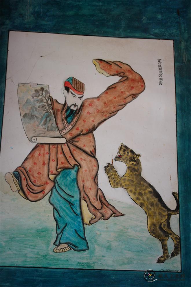 真武观中诙谐的“狗咬吕洞宾”壁画.JPG